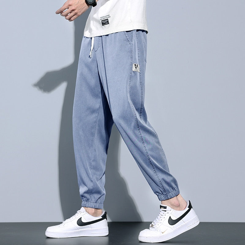 Elastic waist jeans with V print