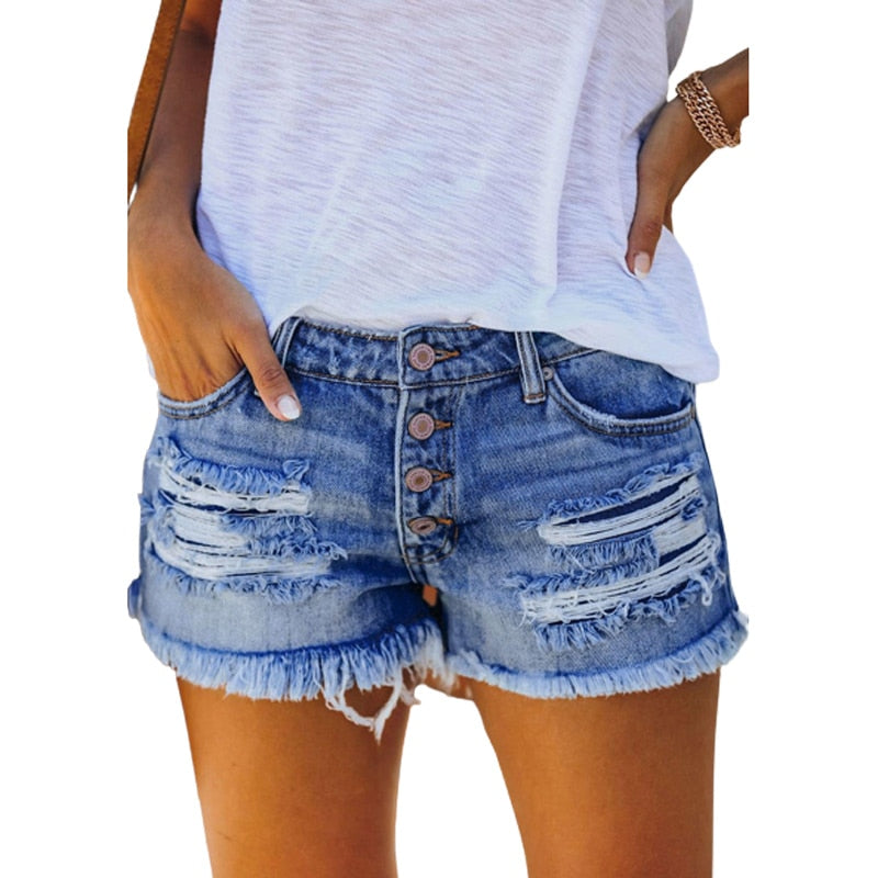 Petite high-rise denim shorts with distressing in blue