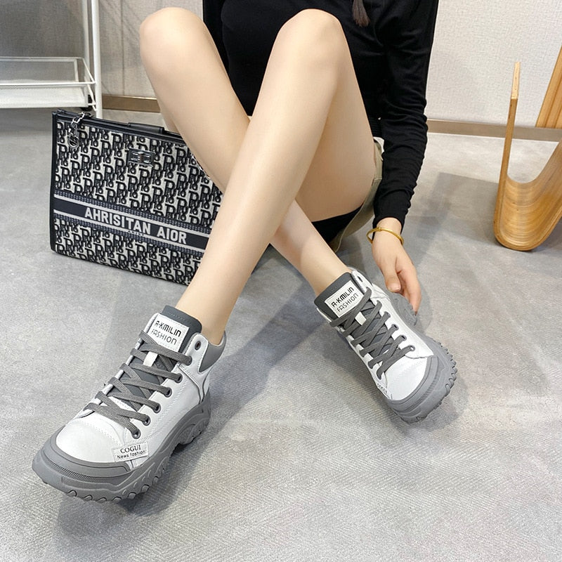 In black and gray, real leather platform sneakers